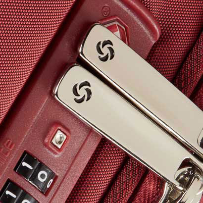How do you reset a Samsonite luggage combination lock?