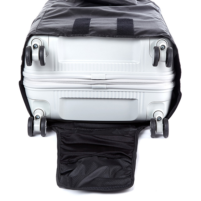 TRAVEL ESSENTIALS FOLD. LUGGAGE COVER TRUNK